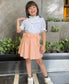 White Ruffled Blouse & Striped Peach Skirt